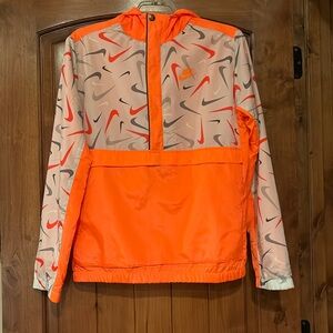 Nike half zip pullover windbreaker.